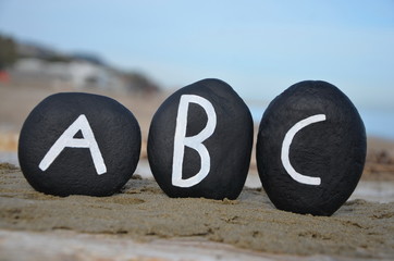 ABC on black stones