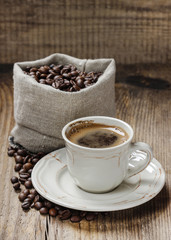 Cup of coffee on wooden table