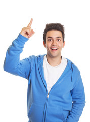 Hispanic guy pointing upwards