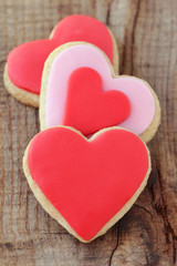 Obraz na płótnie Canvas Heap of romantic heart shaped homemade Valentine cookies