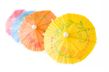 Multicolored Cocktail Umbrellas, spring and summer symbol, isola