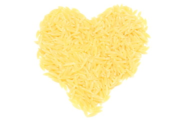 Heart shaped pasta on white background