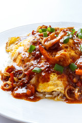 Thai omelette with spicy sour sauce