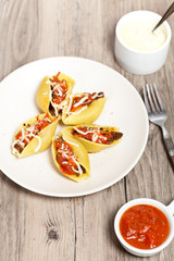 Jumbo Shells pasta staffed with meat and tomato sauce