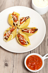 Jumbo Shells pasta staffed with meat and tomato sauce