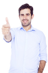 Fototapeta premium Handsome latin man thumbs up over a white background