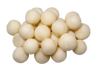 fresh peeled Parisian potatoes on a white background