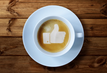 Thumbs up sign in coffee - obrazy, fototapety, plakaty