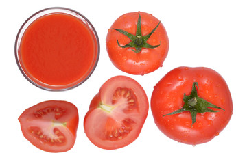 Tomato juice and tomatoes on a white