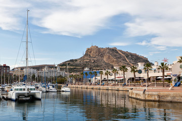 Fototapeta na wymiar Catamaran in the marina in Alicante, Spain