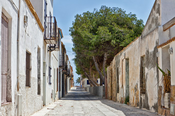 Narrow street in Tarbarca, Alicante, Spain