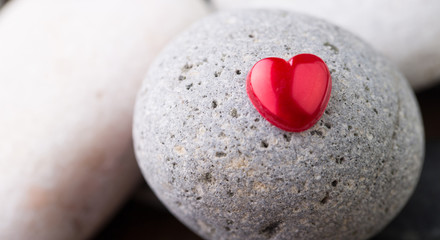 Obraz premium Red Valentine heart object with zen stones