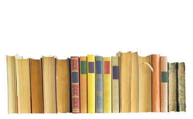row of vintage books isolated on white background, empty labels,
