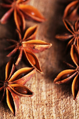 Star anise on wooden background