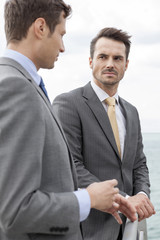 Businessmen having a discussion on terrace