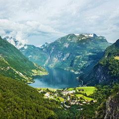 Norway landscape Mountains and village in Geiranger fjord.