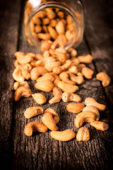 Fototapeta premium Cashew nuts splashed