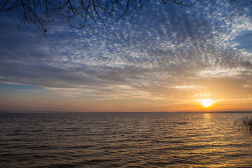Running clouds on the Great sky over lake