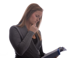 Young girl reading book