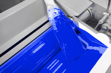 Printer is running blue color ink down at offset printed machine
