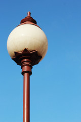 High lamp with blue sky.