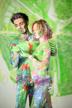 man and girl in studio with whole body in paint