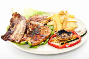 Pork steak, potatoes and vegetables