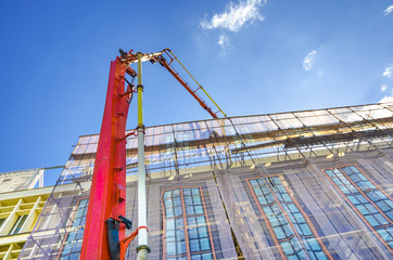 Construction Tower Crane Pouring Concrete