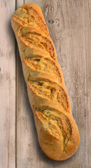 Baguette on rustic wood