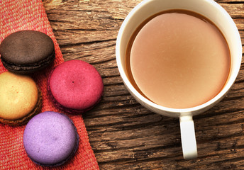 Macaron dessert on the wood background