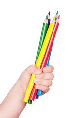 Naklejka premium colorful pencil in child hand isolated