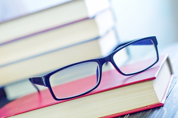 glasses and books