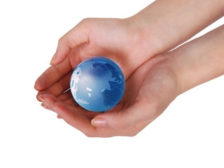 glass globe in female hands