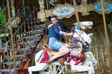 Couple on a Parisian merry-go-round