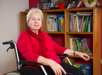 female senior in wheelchair at home