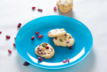 Cranberry cookies on blue plate