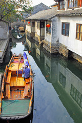 Zhouzhuang, Tourist boat in a village canal.