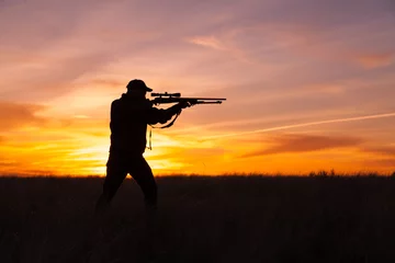 Muurstickers Shooting at Sunset © natureguy