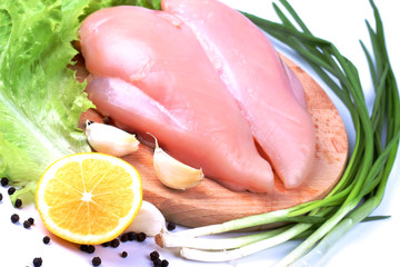 Chicken breasts on cutting board