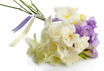 Beautiful bouquet of freesias, isolated on white