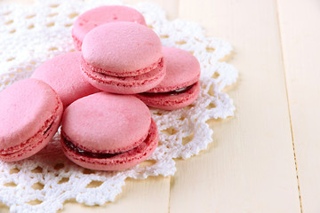 Gentle macaroons on table close-up