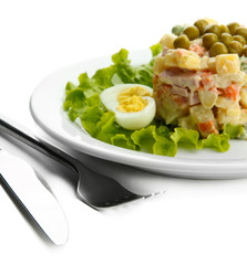 Russian traditional salad Olivier, isolated on white