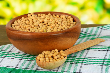 Soy beans on table on bright background