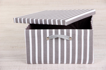 Textile box on floor in room