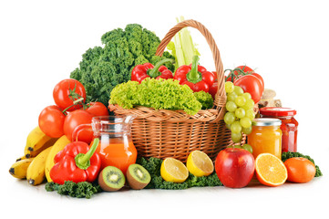 Variety of organic vegetables and fruits in wicker basket