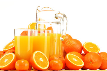 Composition with glasses of orange juice and fruits