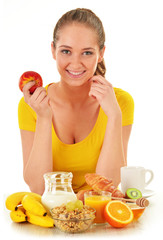 Young woman having breakfast. Balanced diet