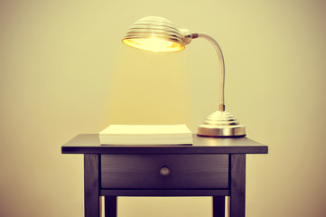 gooseneck lamp and blank paper sheets