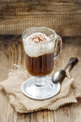 Irish coffee on wooden table