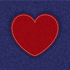 Fototapeta premium Red jeans heart on a blue jeans background